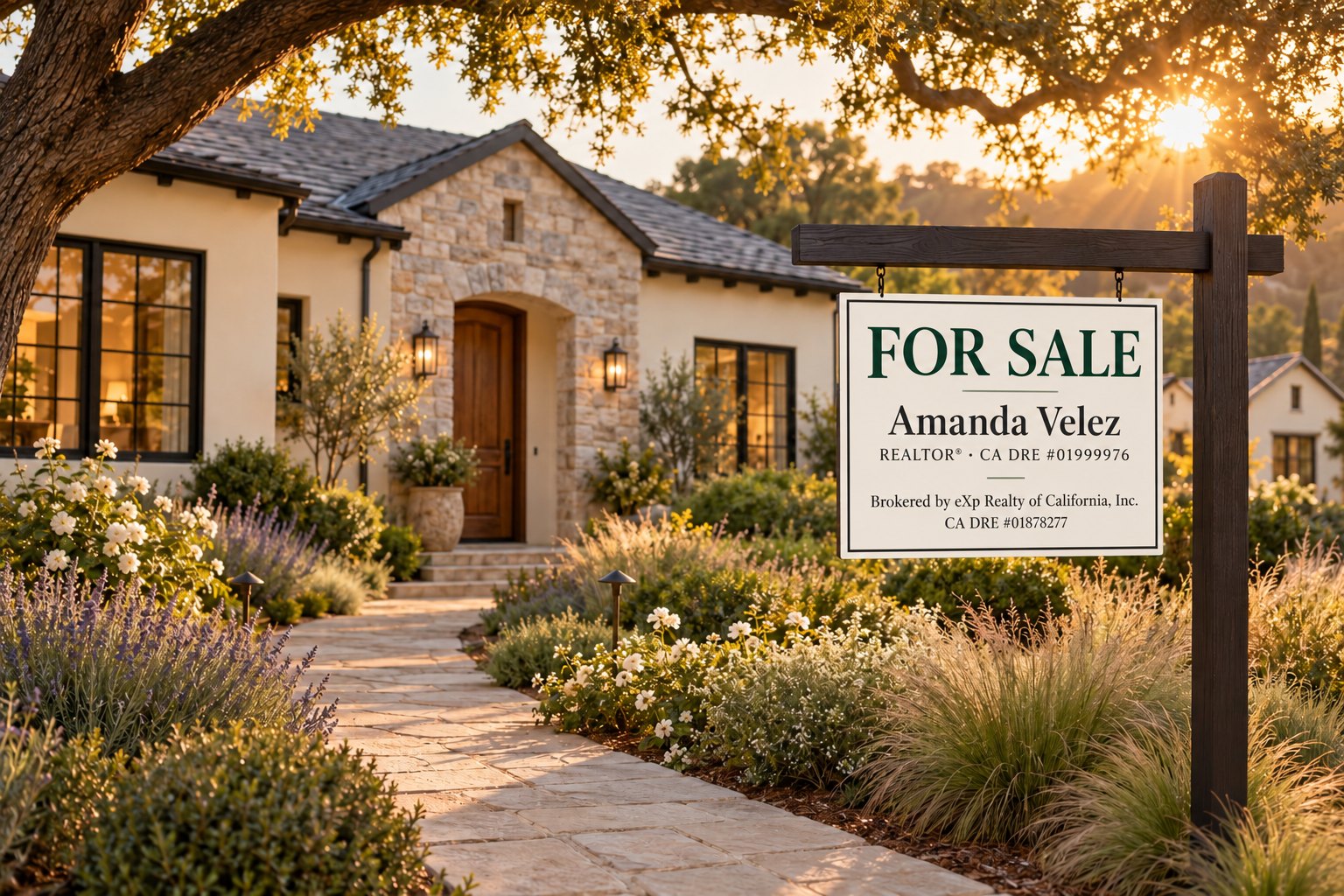An Amanda Velez FOR SALE sign beside the stone walkway of an East Bay home at golden hour